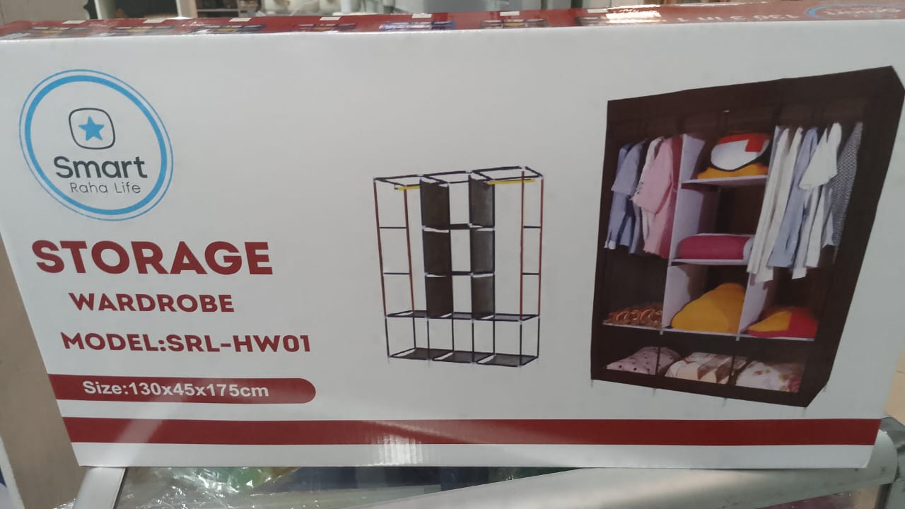 3 column mettalic wadrobe This Portable Fabric Wardrobe is a versatile and space-saving solution designed to keep your clothing and accessories organized. Its sleek and modern design fits effortlessly