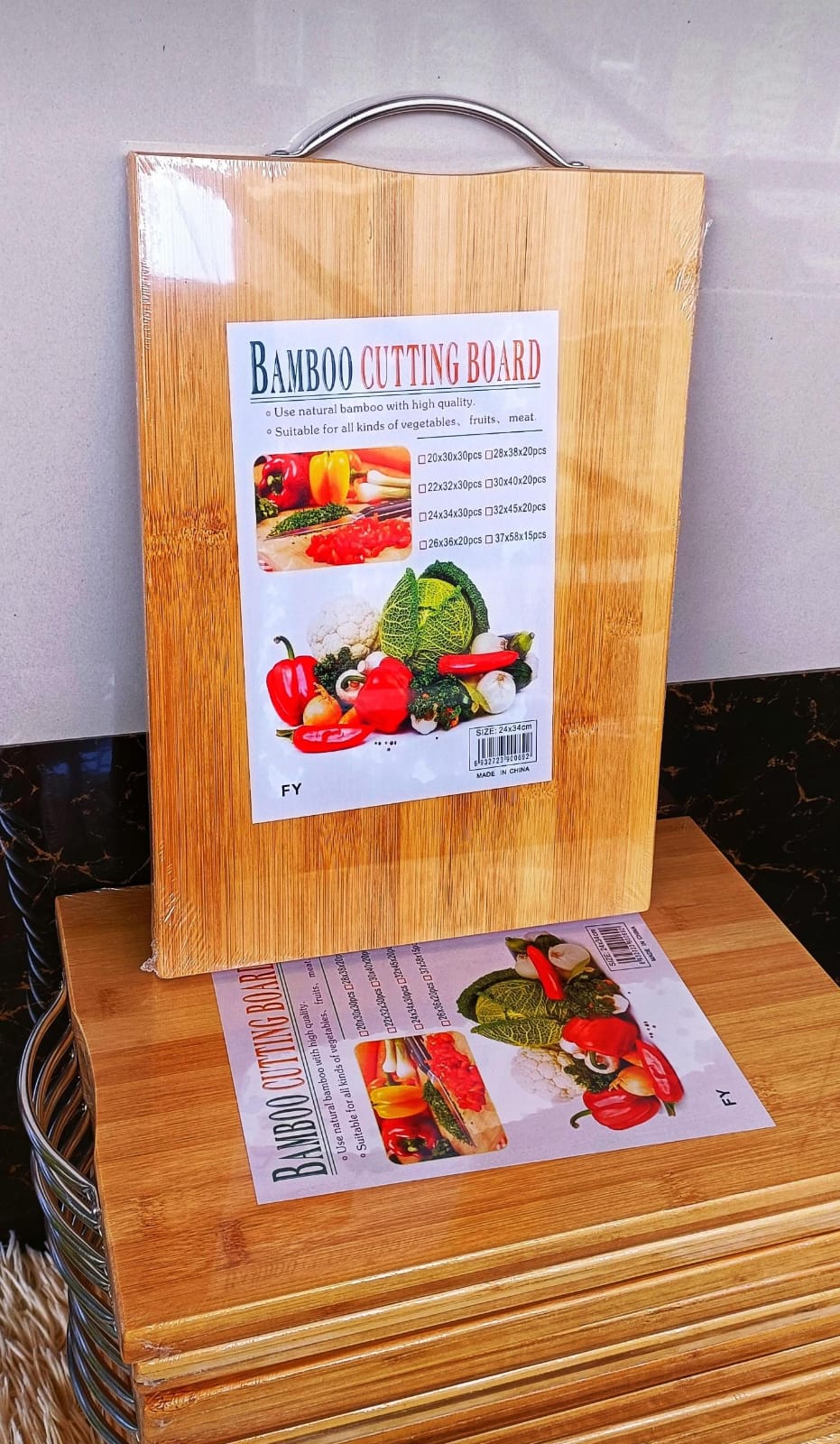 Bamboo Chopping board(28*38cm).The chopping board also durable enough to take a beating whether you’re using a long knife or a cleaver to work through tough bones and joints.