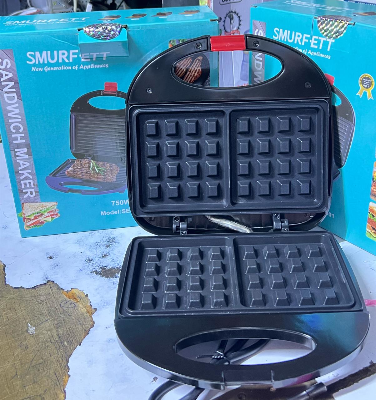 SMURFETT waffle maker 2 slot, Non stick coating, Overheat Protection, locking lip makes sure your sandwich is toasted to perfection and that know when it is ready to go.