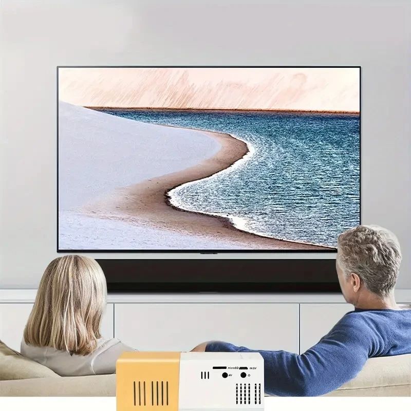 YG300 New small projector home portable high-definition projector, plug-in connection with the phone's built-in audio
