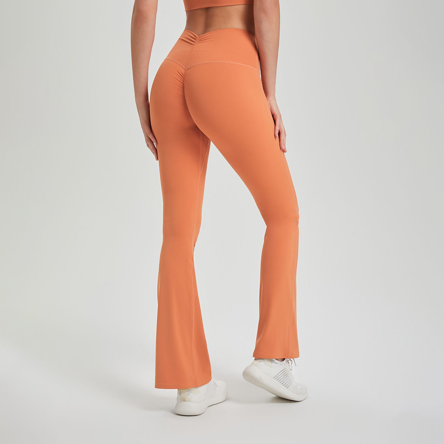 New high waisted pleated buttocks lifting pants, anti roll edge nude yoga pants, running and sports pants for external wear, breathable fitness bell pants, suitable for sports, yoga, Pilates, daily we