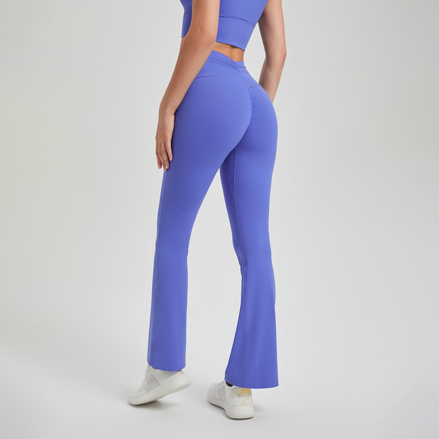 New high waisted pleated buttocks lifting pants, anti roll edge nude yoga pants, running and sports pants for external wear, breathable fitness bell pants, suitable for sports, yoga, Pilates, daily we
