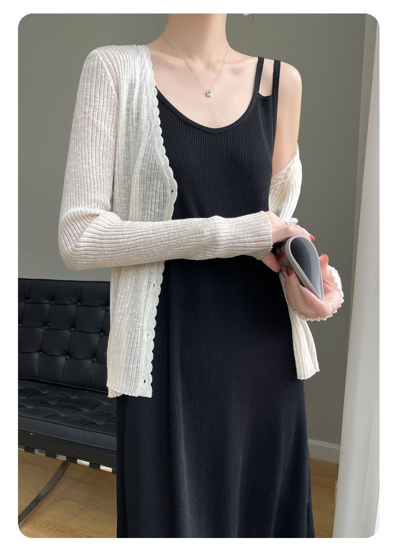 A new ice silk knitted camisole dress for women, with a side slit inside. It is a slim fitting dress that goes over the knee, a large-sized black camisole dress, and a V-neck solid color dress