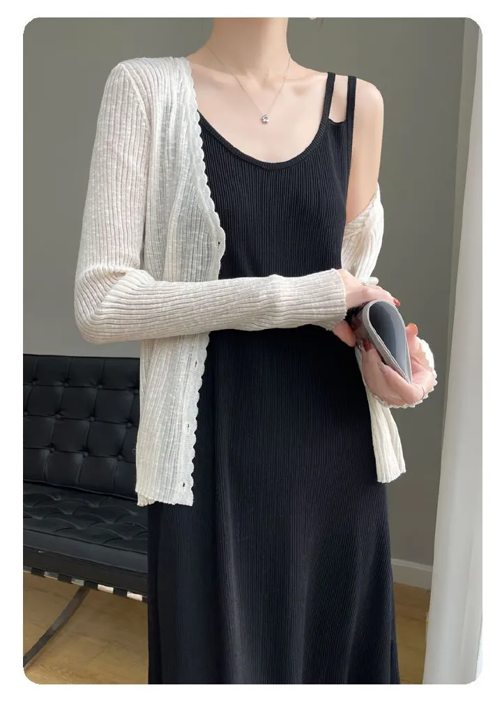 A new ice silk knitted camisole dress for women, with a side slit inside. It is a slim fitting dress that goes over the knee, a large-sized black camisole dress, and a V-neck solid color dress