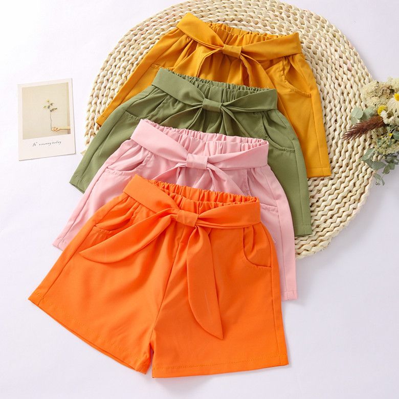 Hot selling girls' shorts, new summer pants, trendy loose bow shorts for external wear, girls' hot pants, solid color lace up, with pockets, convenient and stylish, simple and stylish