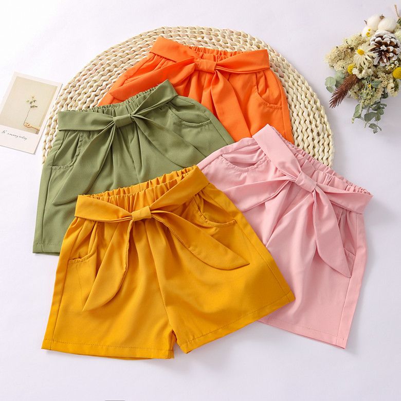 Hot selling girls' shorts, new summer pants, trendy loose bow shorts for external wear, girls' hot pants, solid color lace up, with pockets, convenient and stylish, simple and stylish
