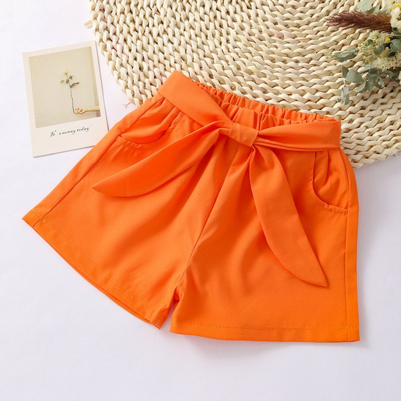 Hot selling girls' shorts, new summer pants, trendy loose bow shorts for external wear, girls' hot pants, solid color lace up, with pockets, convenient and stylish, simple and stylish