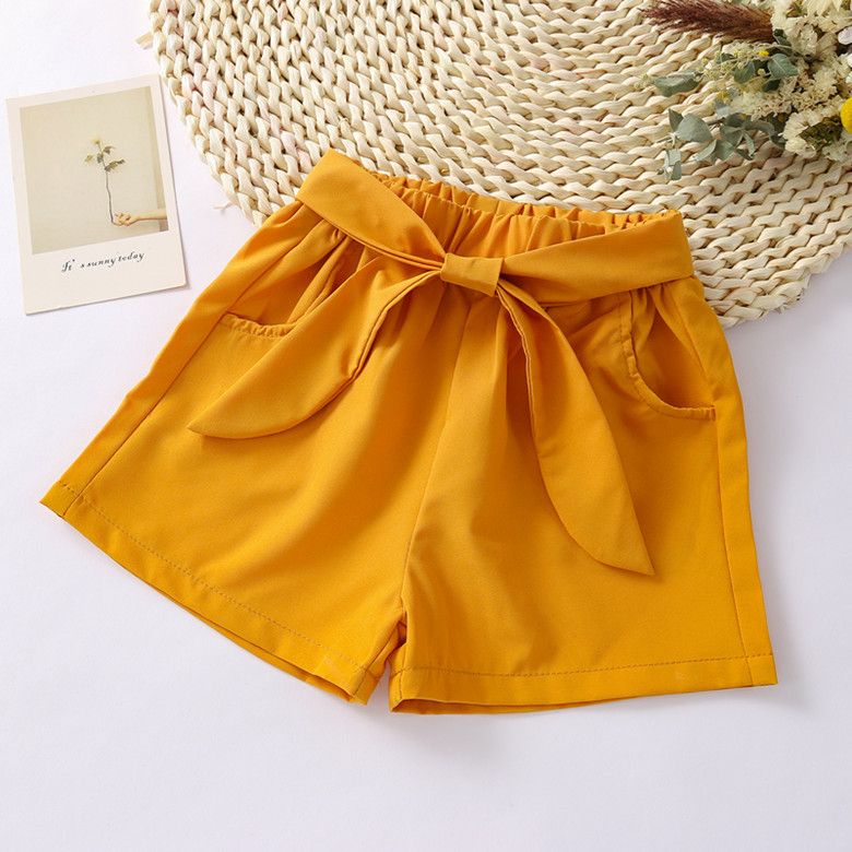 Hot selling girls' shorts, new summer pants, trendy loose bow shorts for external wear, girls' hot pants, solid color lace up, with pockets, convenient and stylish, simple and stylish