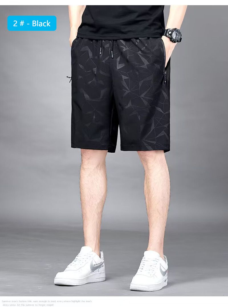 Summer hot selling ice silk casual shorts, men's loose quarter pants, elastic quick drying sports pants, printed beach pants, fashionable large shorts, casual and versatile, with drawstring design