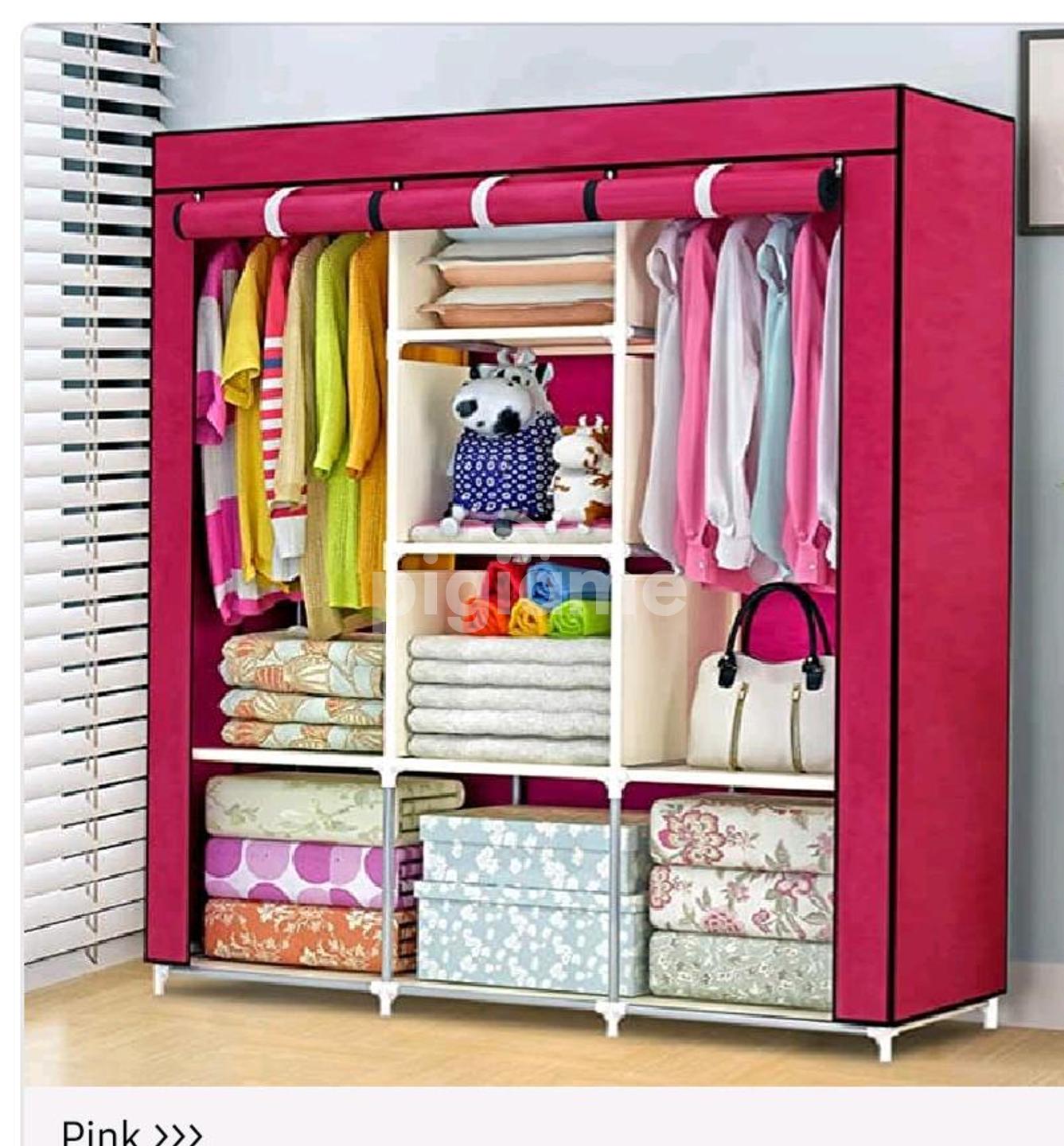 Metallic wardrobe Use these strong framed  portable wardrobes to add extra storage space to your guest room or any room that might need it. This heavy duty wooden frame is very durable. It's perfect f