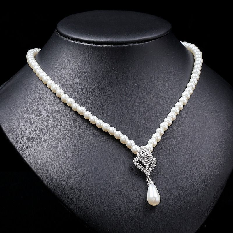 2024 African personality pearl necklace earring set light luxury niche all fashion temperament explosive alloy electroplated bridal dress accessories