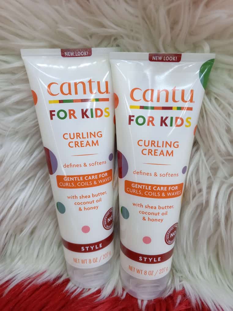 Cantu Care For Kids Curling Cream defines softens ,, gentle care for curls ,coils and waves with shea butter ,coconut oil and honey