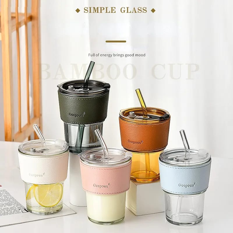 Gorgeous slub glass smoothie cup with STRAW and leather cover .         Colour peach,white,black,blue Made of very strong and durable glass                      .
 Material glass with leather cover