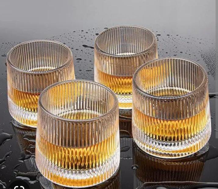 Spinning glass clear Modern yet timeless these will be your go-to glasses for serving any beverage from whiskey, bourbon, scotch, and cocktails to wine, juice, and many more in absolute style.
