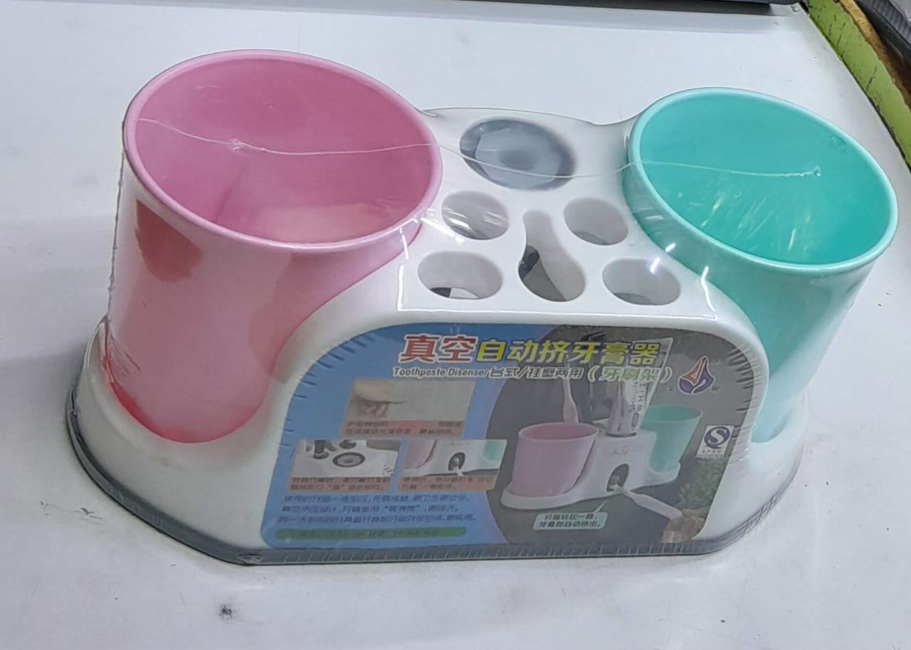 Toothbrush holder with toothpaste dispenser 
creative toothpaste dispenser is made up of toothbrush holder and toothpaste squeezer pump.