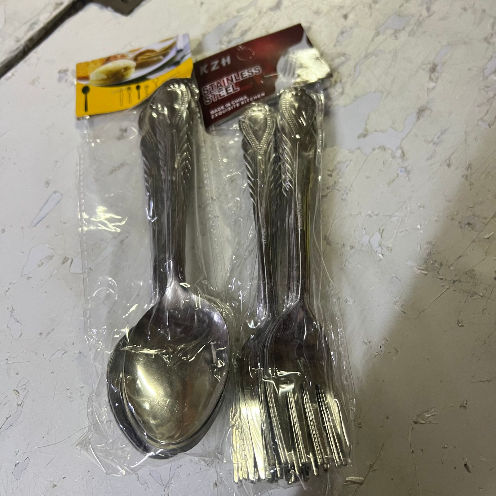 12pcs Table Spoons & 12 Pcs Of Forks - Silver12 stainless steel table spoons
12 stainless steel forks
High aesthetic value
Elegant designs
Excellent polish and finish
WHAT’S IN THE BOX
1 X  12 Pieces