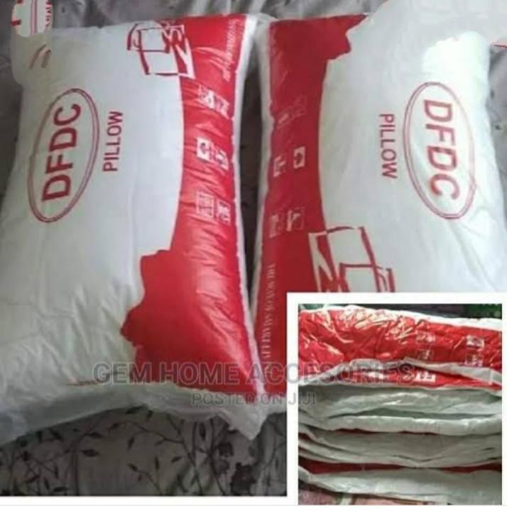 In stock compressed bed pillowsfibre weight ; 750 gramscompressed fibre pillow best and reliablequality itcis durable convenient and elegsntcfor home and commercial use
