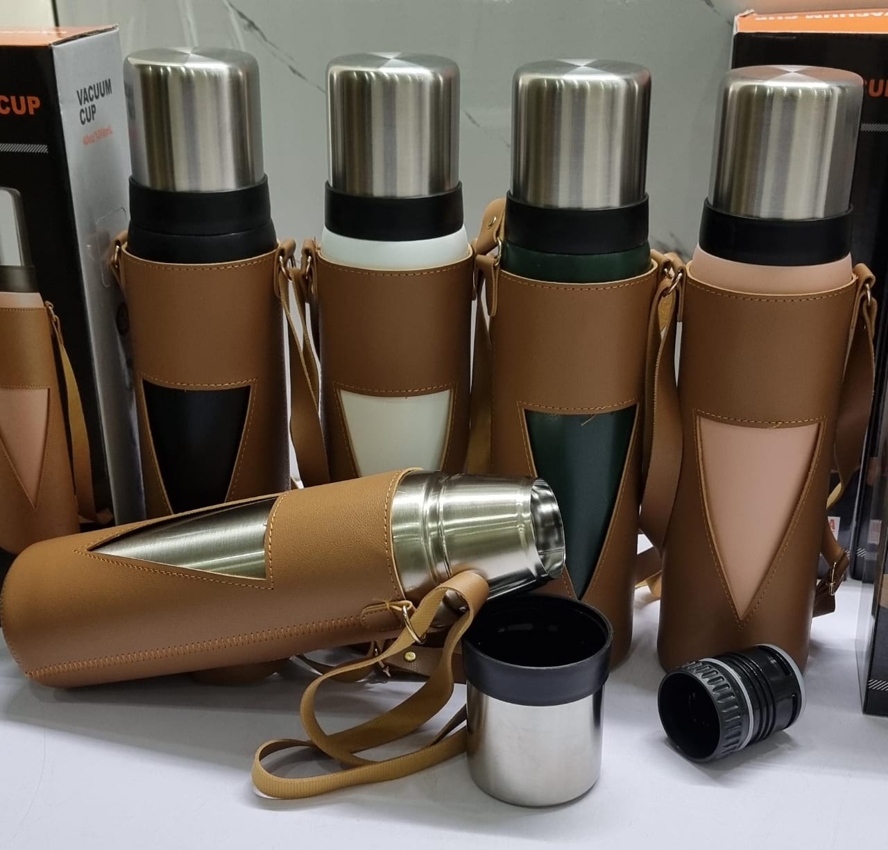 New Arrival: 1000ml and 1200ml camping thermos cups available in a leather carrier bag.