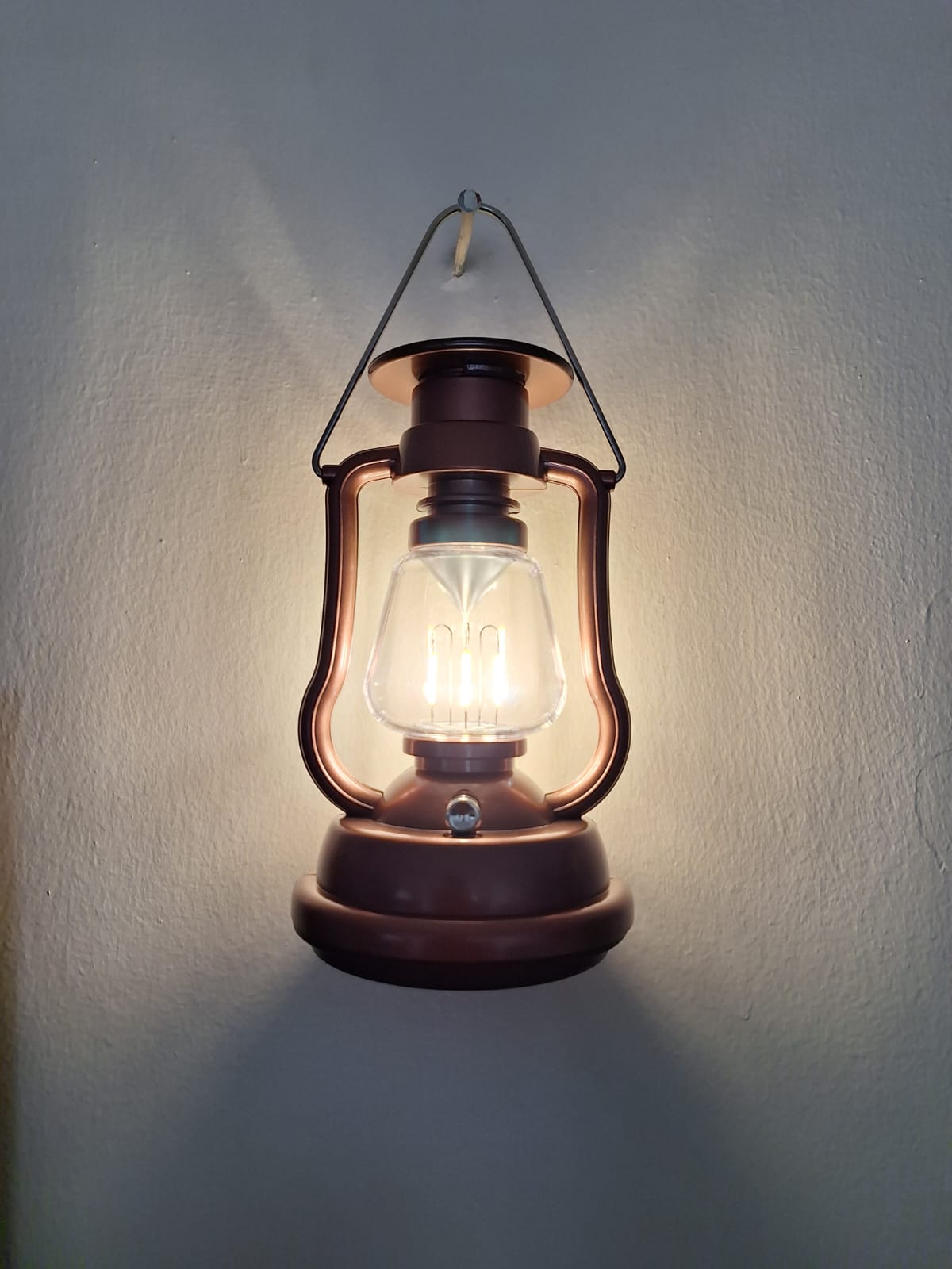 Vintage Portable Solar Lantern. Rechargeable by solar and electricity is ideal for outdoor lighting, power emergency needs and camping It is portable,warm white light and works for up to six hours