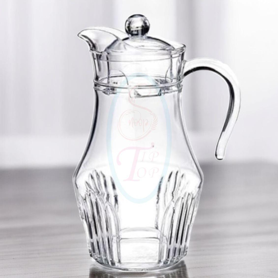 Glass jugClassic water shape is crafted with fire-polished rim. Machine-made using the latest technology to resemble the quality of hand-blown stemware at an everyday price. This Water Jug  features t