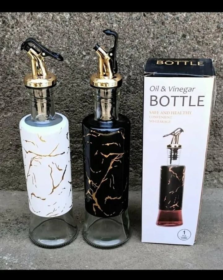 OIL/VINEGAR DISPENSER BOTTLE. Cooking oil dispensers glass bottle with marble design dispenser for olive oil vinegar