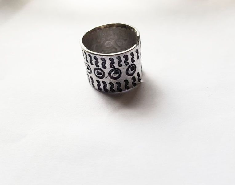 Engraved Metallic Band, a timeless piece that seamlessly blends sophistication with personalization