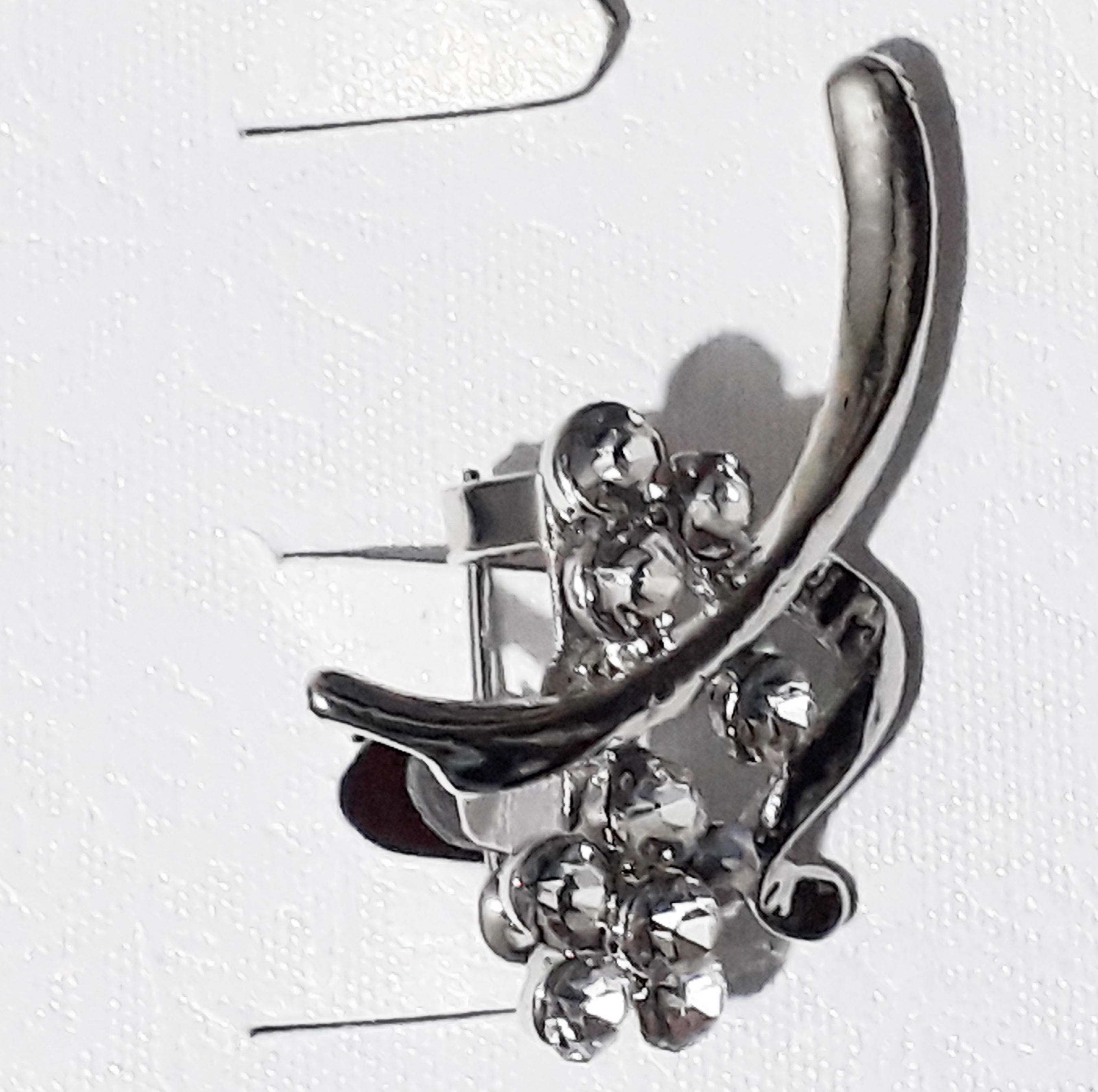 Silver brooches offer a timeless elegance that effortlessly elevates any outfit Crafted with gleaming sterling silver,