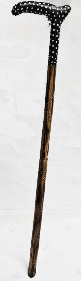 The wooden shaft, sourced from fine timber renowned for its durability and aesthetic appeal, boasts a smooth