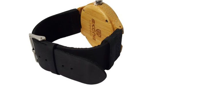 A handmade bamboo watch with leather straps is a unique and eco-friendly timepiece that combines natural materials with classic design elements