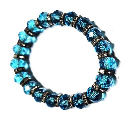 breathtaking blue crystal bracelet, a masterpiece of craftsmanship adorned with an array of meticulously crafted small embellishments.