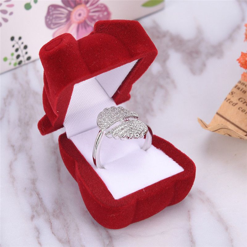 enchanting maroon teddy bear velvet ring box. Soft to the touch, its plush velvet exterior cradles a precious token of affection