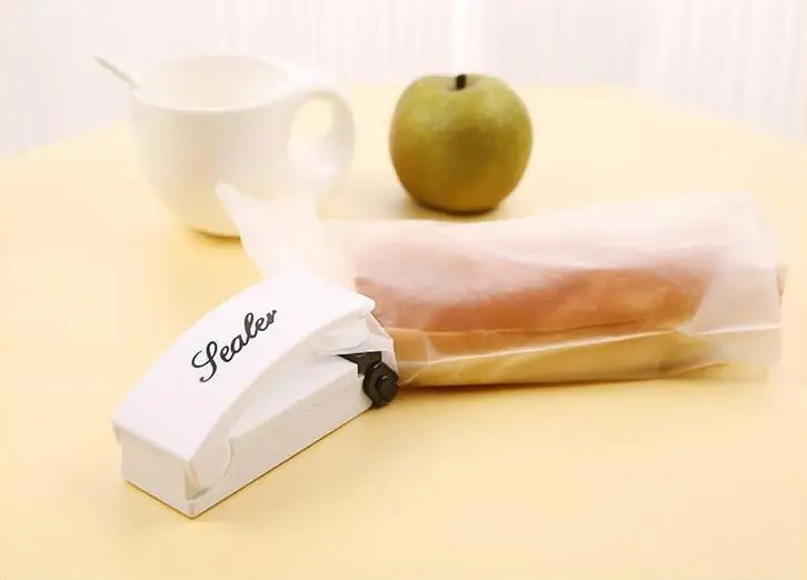 (Easter sale) Mini Handheld Food Sealer Tool Plastic Portable Sealing Machine Heat Bag Packing