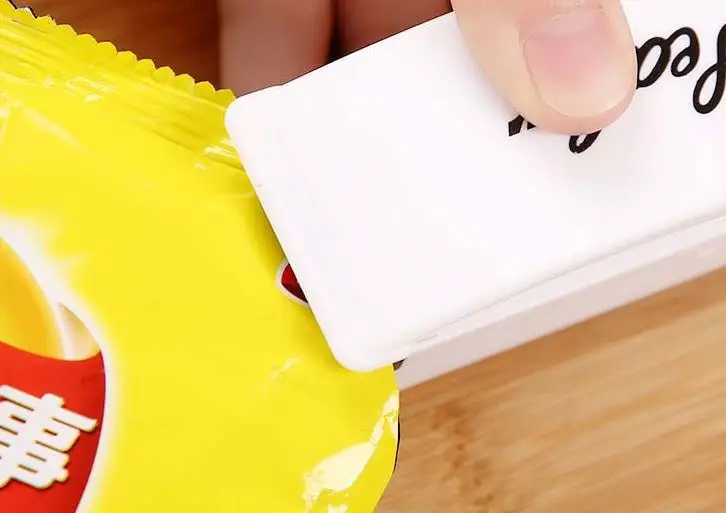 (Easter sale) Mini Handheld Food Sealer Tool Plastic Portable Sealing Machine Heat Bag Packing