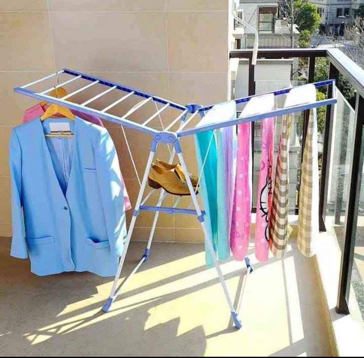 Foldable/Portable Clothes Drying And Hanging Rack; It doesn't rust. It can be used on balconies and preferably for hanging machine washed clothes.