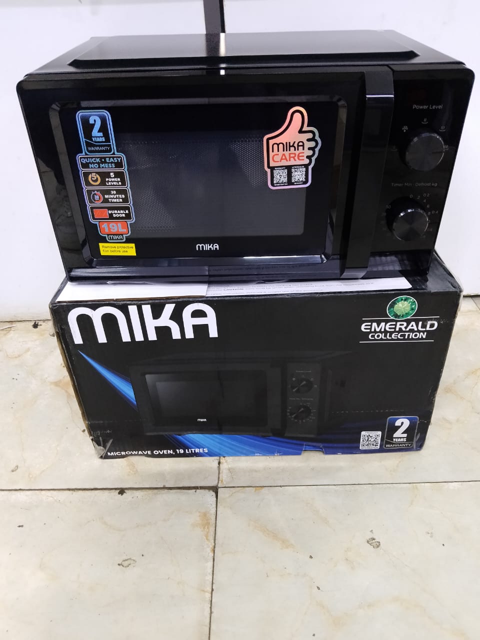 Mika manual Microwave Minutes Timer. Durable Glass Door With Handle.