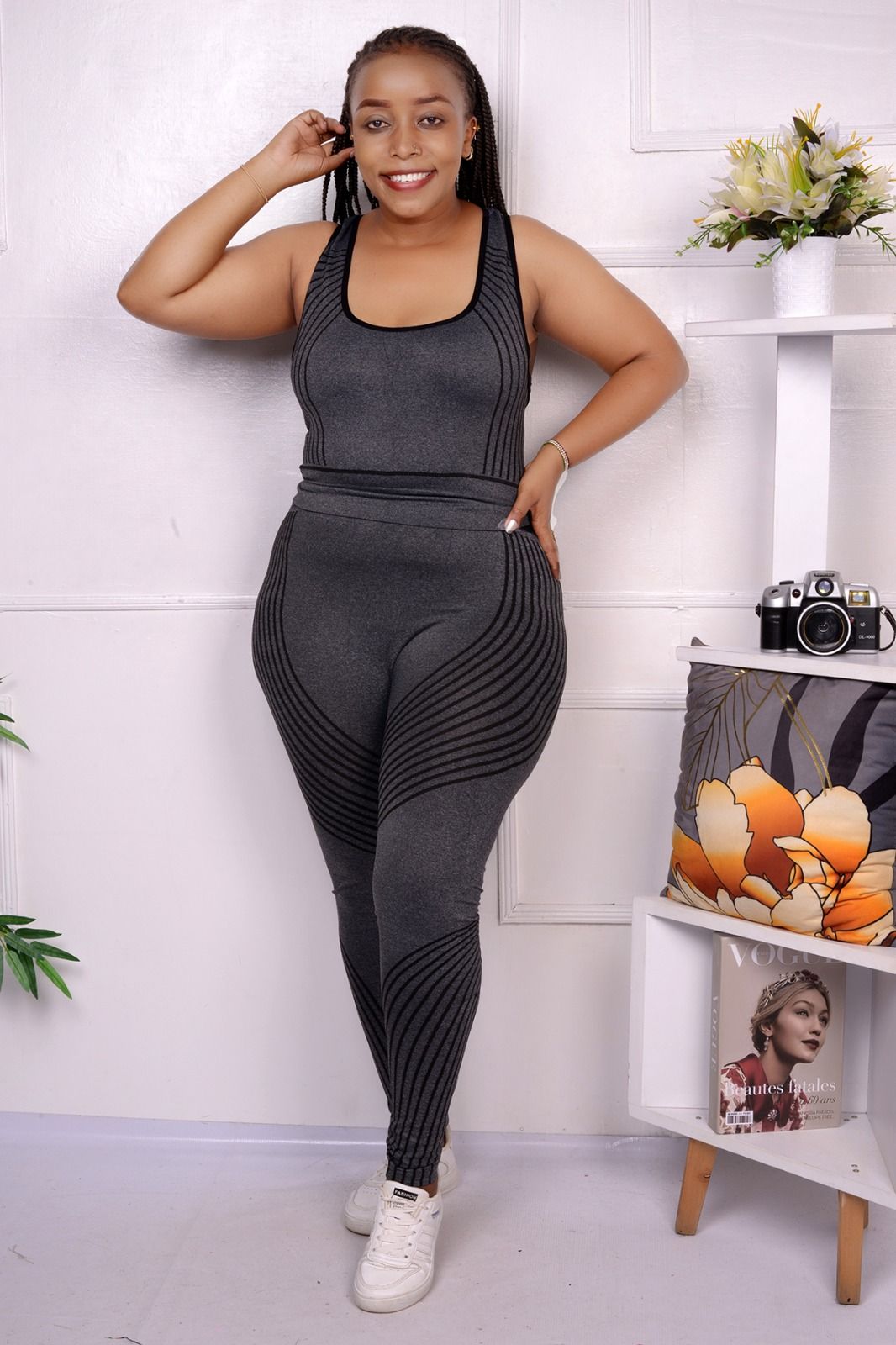 Trendy Gym Wear for Kenyan Women: The Gray and Black Seamless Set You Need in 2025The fabric of this two-piece set is a stretchy, moisture-wicking blend that hugs the body without restricting movement