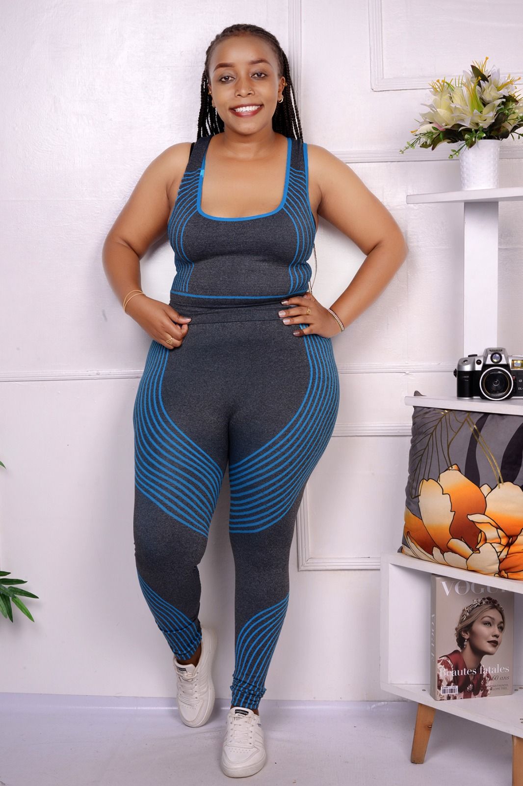 Trendy Gym Wear for Kenyan Women: The Gray and Black Seamless Set You Need in 2025The fabric of this two-piece set is a stretchy, moisture-wicking blend that hugs the body without restricting movement