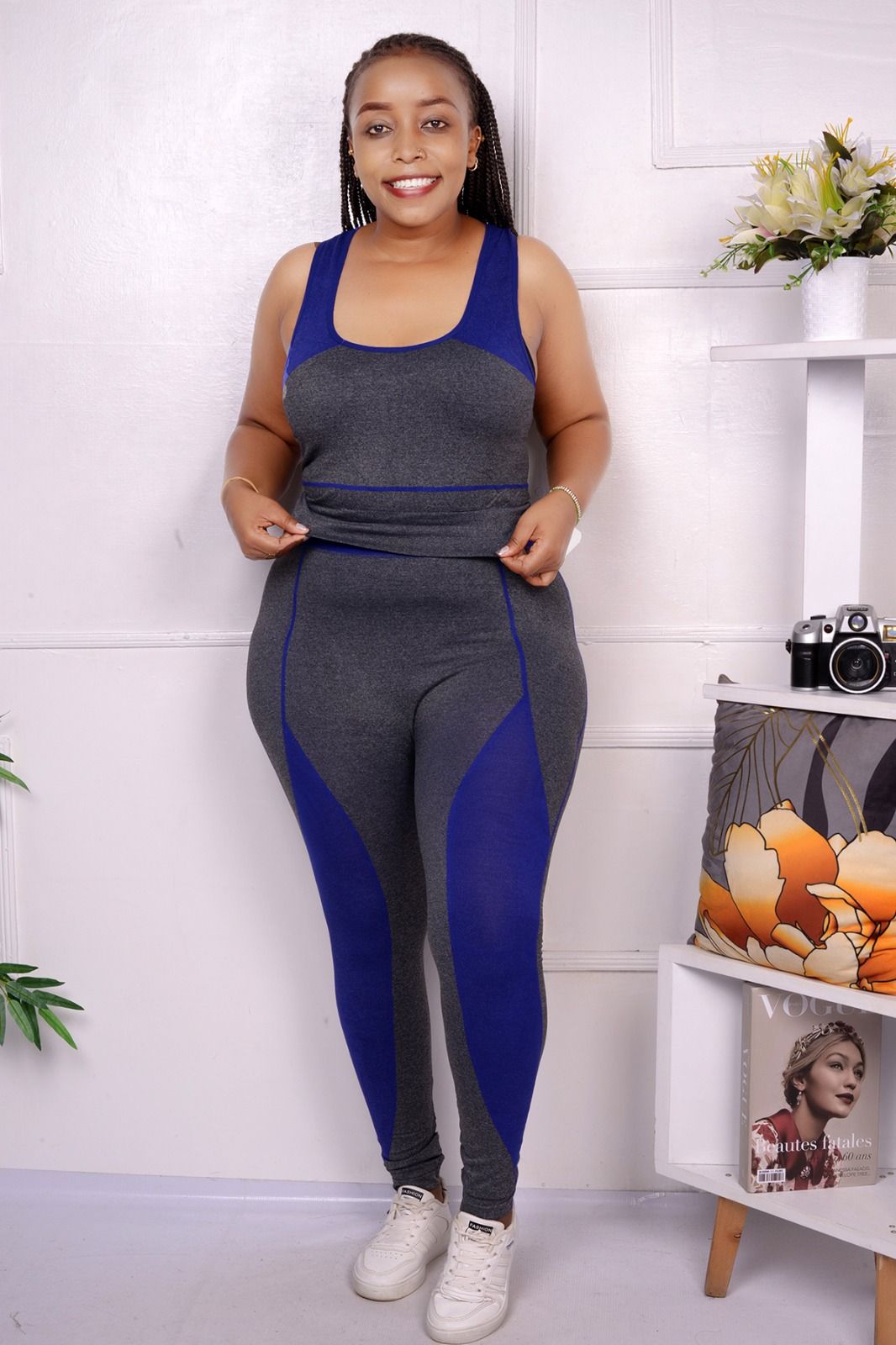 Trendy Gym Wear for Kenyan Women: The Gray and Black Seamless Set You Need in 2025The fabric of this two-piece set is a stretchy, moisture-wicking blend that hugs the body without restricting movement