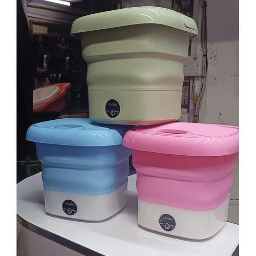 Mini foldable washing machine This is a small foldable portable washing machine, its small size is very suitable for washing children\'s clothes, underwear, socks, towels, etc. Elution dual-purpose, deep stain removal.
