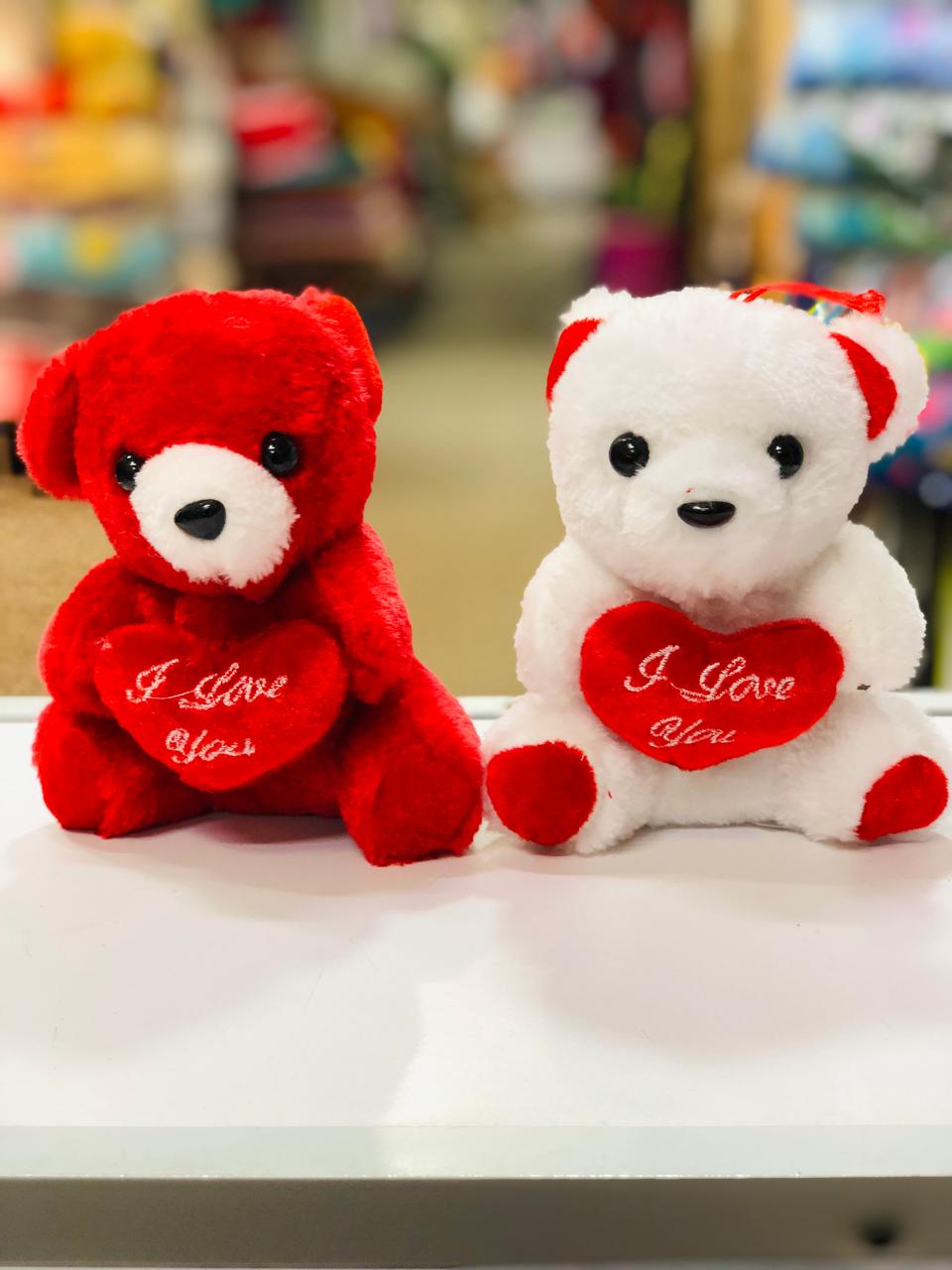 Fashion Baby Teddy Bear With Heart Gift Set small This stunning teddy bear looks like a radiant rose bouquet with its textured rose fur and bright red paw pads. It holds a heart plush for an extra special touch