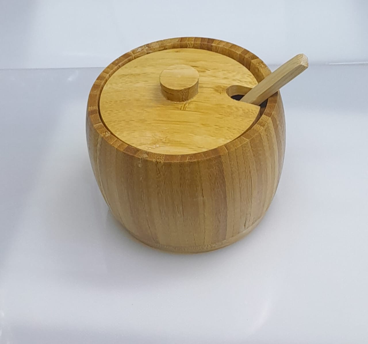 Bamboo sugar dish with bamboo teaspoon This classic sugar bowl is a lovely housewarming gift to welcome a new neighbor or for a new homeowner just starting their housewares stock. Crafted of quality b