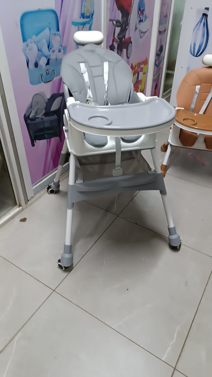 THE LATEST  only  the baby will feed,rest and sleep  in the same feeding  chair. It has wheels, it's foldable, has headrest  with a soft pad,