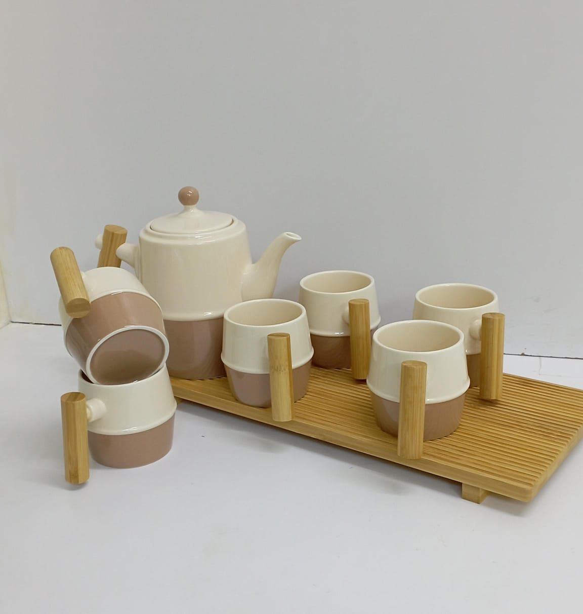 Nordic tea set with rectangular wooden tray The stand which brings elegance to your kitchen and dining table. 
The tea set is made to satisfy the user in terms of elegance and splendor
