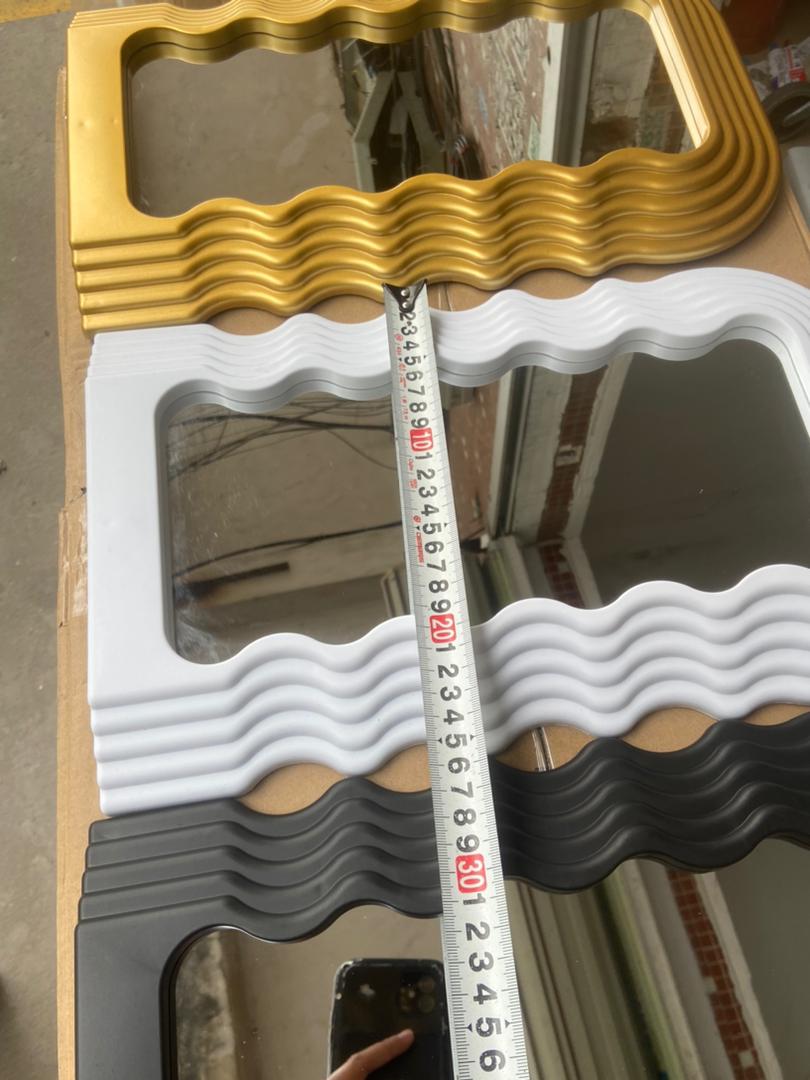 Tabletop wavy classy or wall-mounted decor mirrors are available in gold, black, and white.