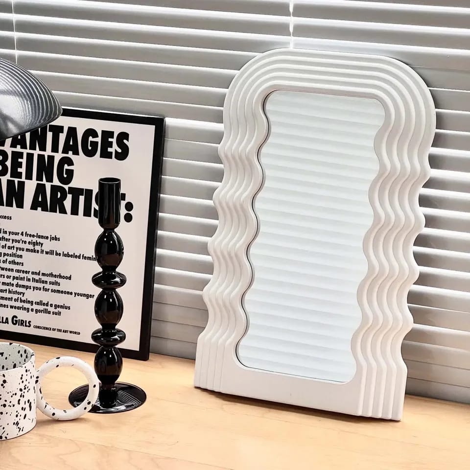 Tabletop wavy classy or wall-mounted decor mirrors are available in gold, black, and white.