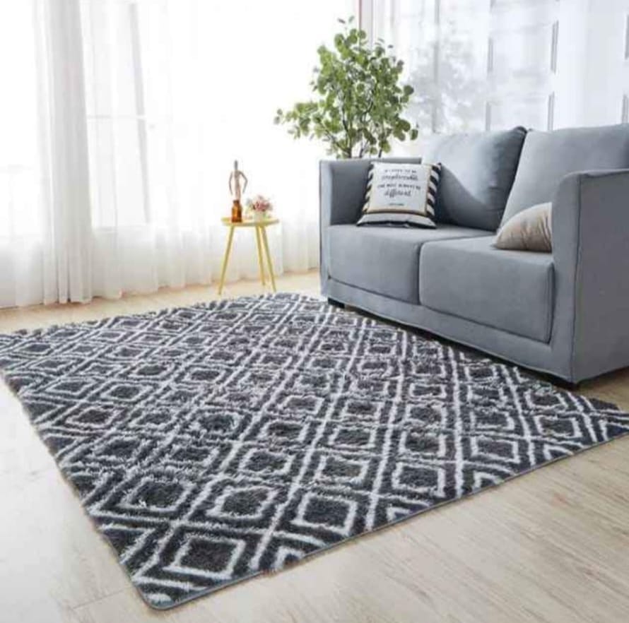 HIGH QUALITY 3D (5*8) TURKEY FLUFFY PATERNED CARPETS, AMAZING TEXTURE AND SHAPE. VERY PRESENTBLE CARPETS AND DOORMATS