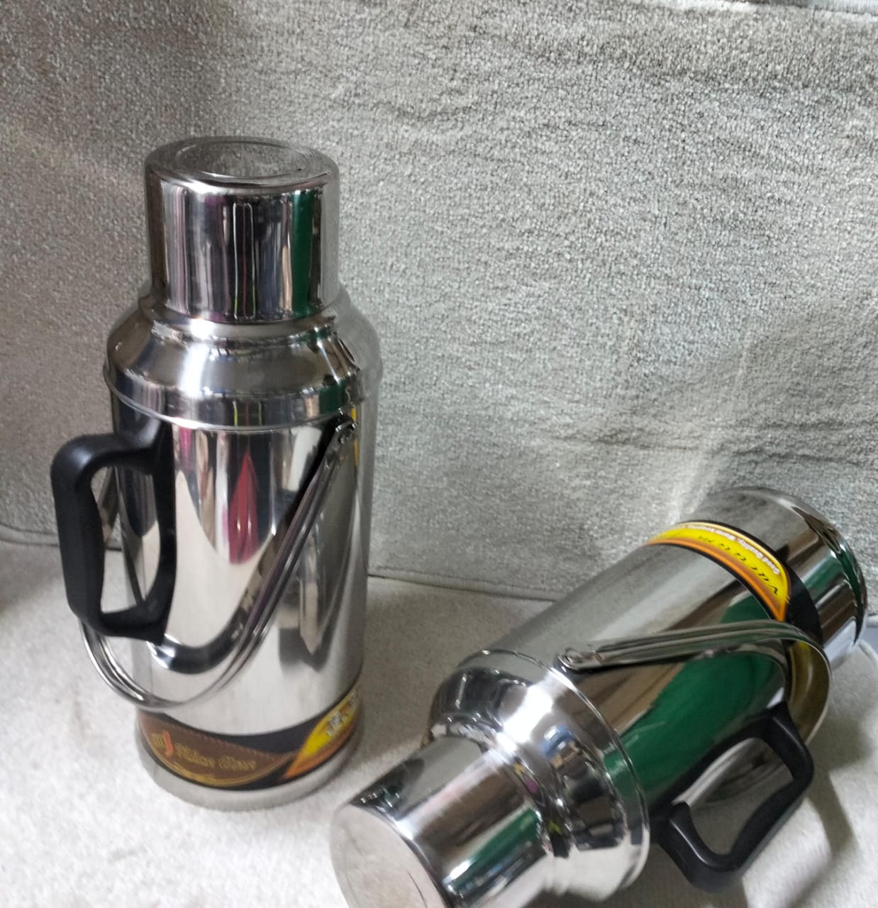 SPECIAL OFFER Nice One 3.2L High Quality Thermos Flask.. It is durable and reliable for keeping your tea/water hot for 24 hours. Has two handles; one carry handle and other for easy serving