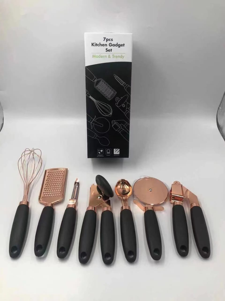 7 PCS High quality 7pcs Kitchen gadget set/copper plated serving spoons

Consist of whisk,grater,pizza cutter,garlicpress,can opener ,ice-cream scoop and peeler silicon