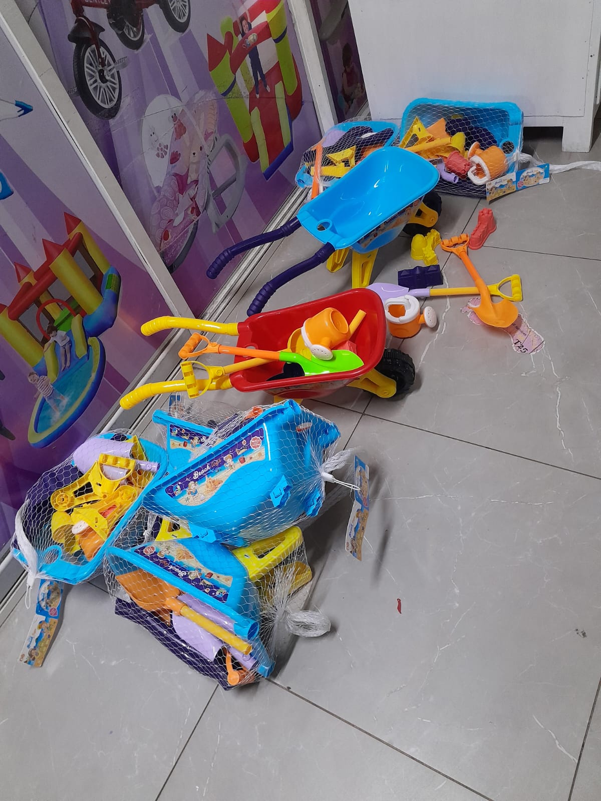 Beach toys/ garden wheelbarrow tools
Doll accessories