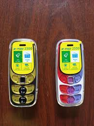 Xtigi phone X Tigi 2300Super Tiny Dual Sim Wireless Fm Radio Bluetooth Dial feature phone